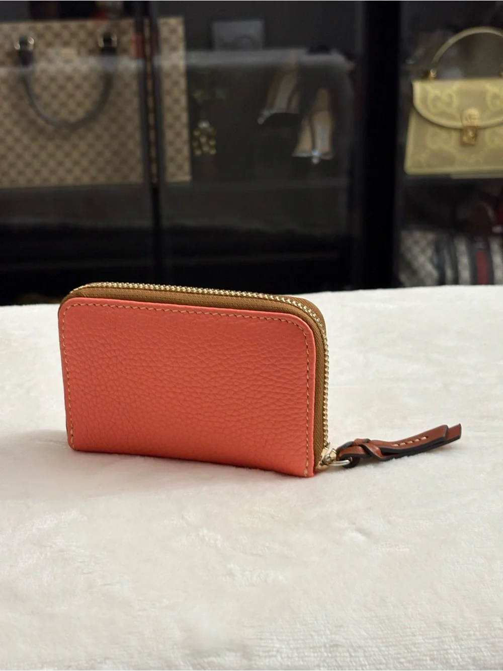 Dooney & Bourke Pebble Grain Large Zip Around Credit Card Case  Coral Color.